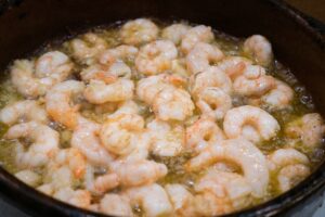 Photo of shrimp boiling in a pot.